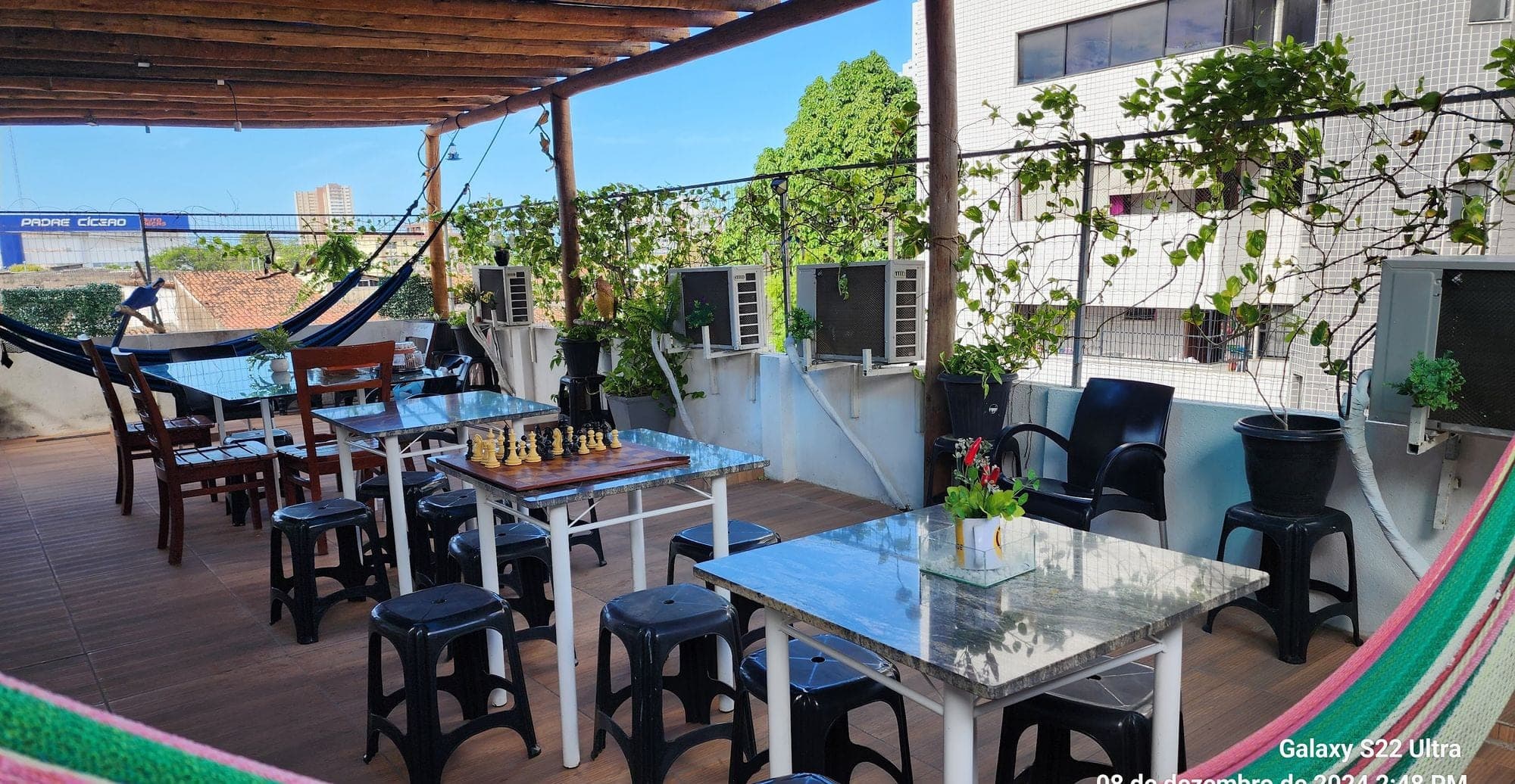 Rooftop do Coworking Parquelândia em Fortaleza — área externa de convivência